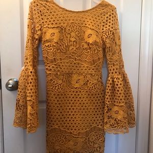 Mustard yellow mini dress with bell bottom sleeves